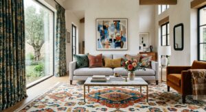 A high-end editorial interior design photograph showcasing a neutral-toned living room transformed b